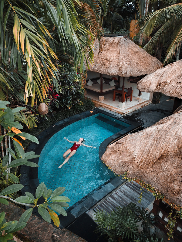 bali hotel and villa: woman swiming
